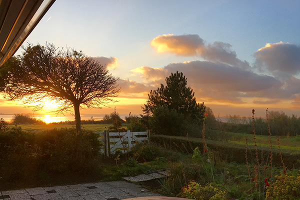 Kleurig verschijnt de zon